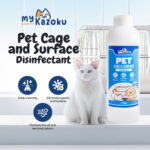 kleenso A bottle of myKazoku Pet Cage and Surface Disinfectant 1L sits by a white cat, offering deep cleaning, germ and bacteria elimination, and odor removal.